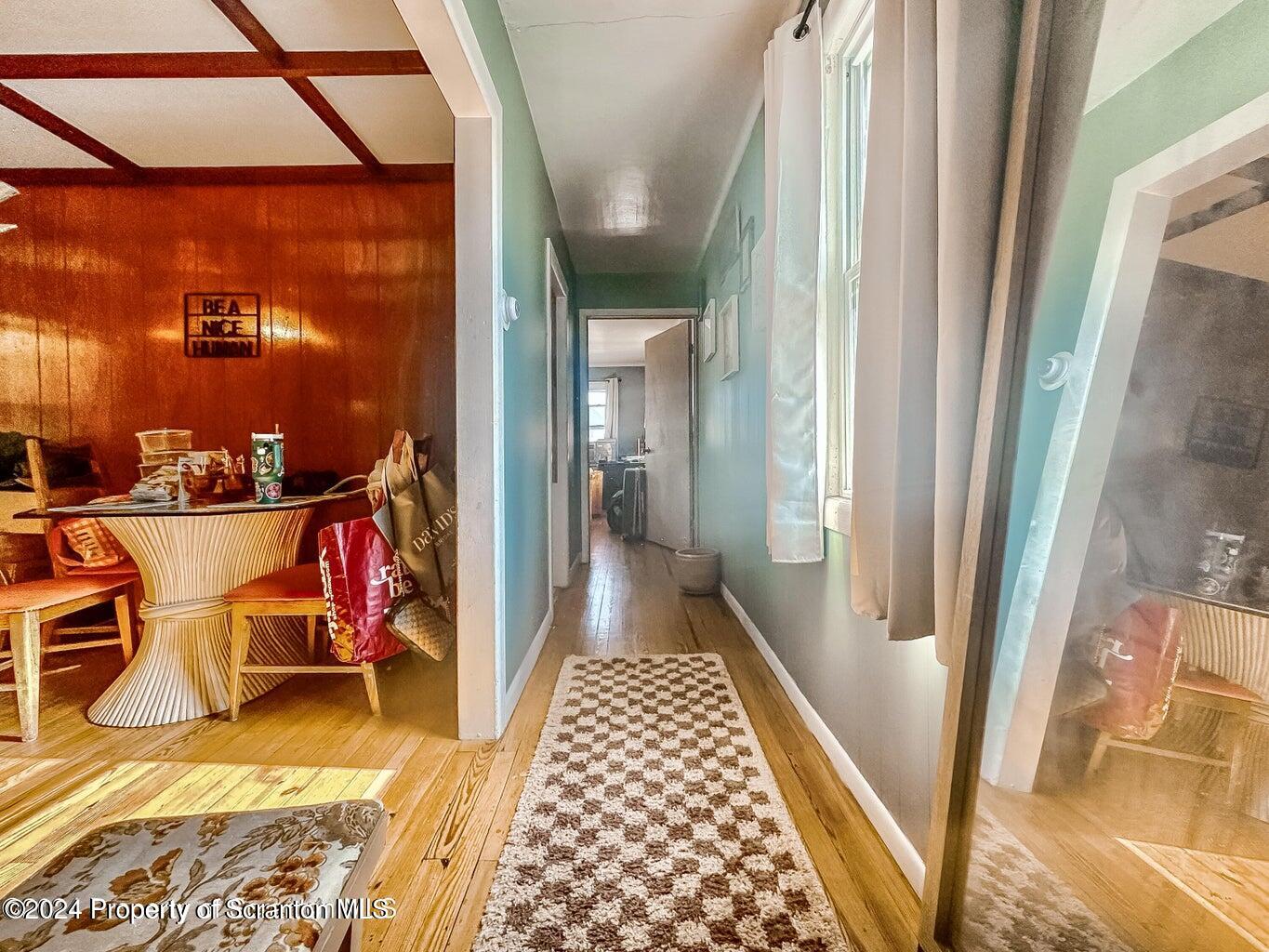 218 Hand Street, Unit 2 Jessup, PA 18434 - Photo 6 of 15 a view of a balcony with chairs and front door