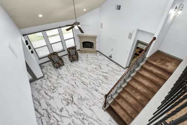 a view of an entryway with a fireplace