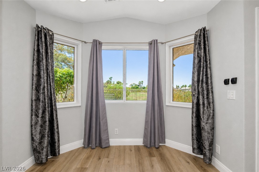 2278 Ramsgate Drive Henderson, NV 89074 - Photo 8 of 34 A quiet corner room offers a serene view of the verdant golf course.