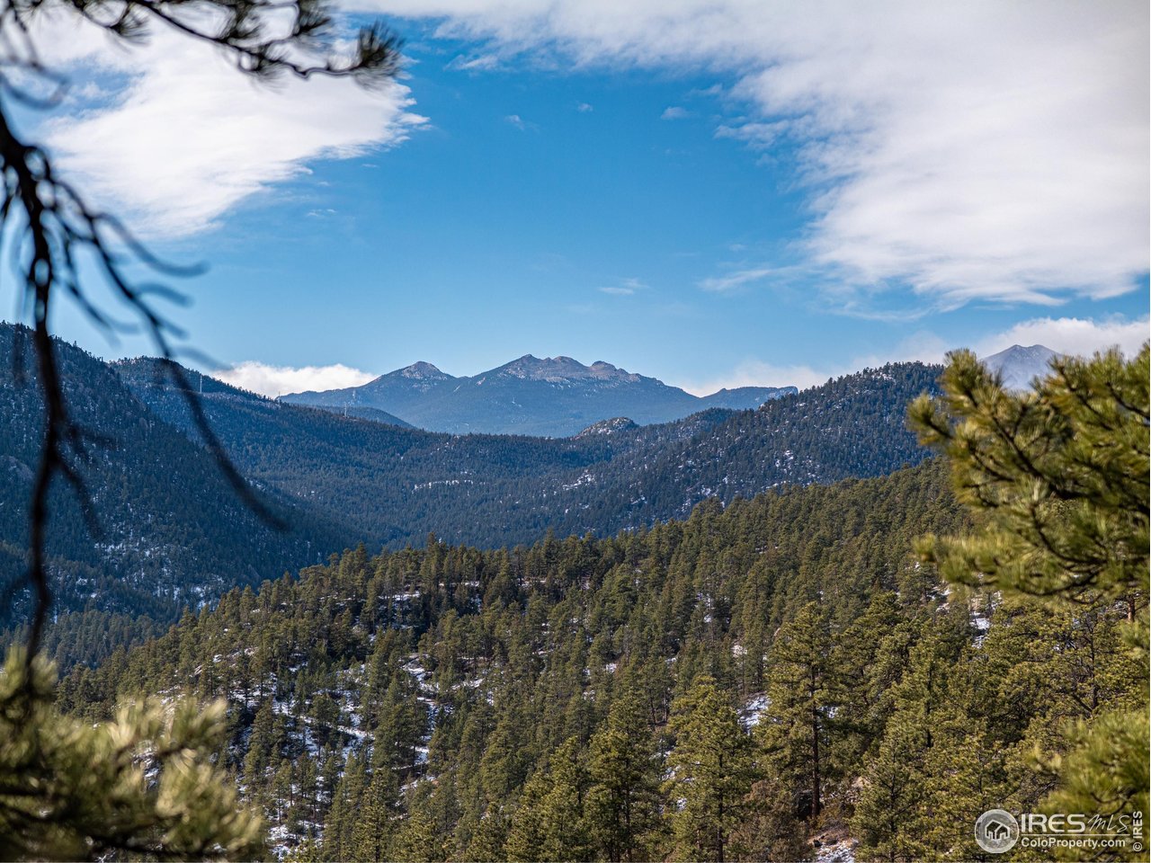 2127 Us Highway Drake, CO 80515 - Photo 24 of 34 a view of a house with a mountain in the background