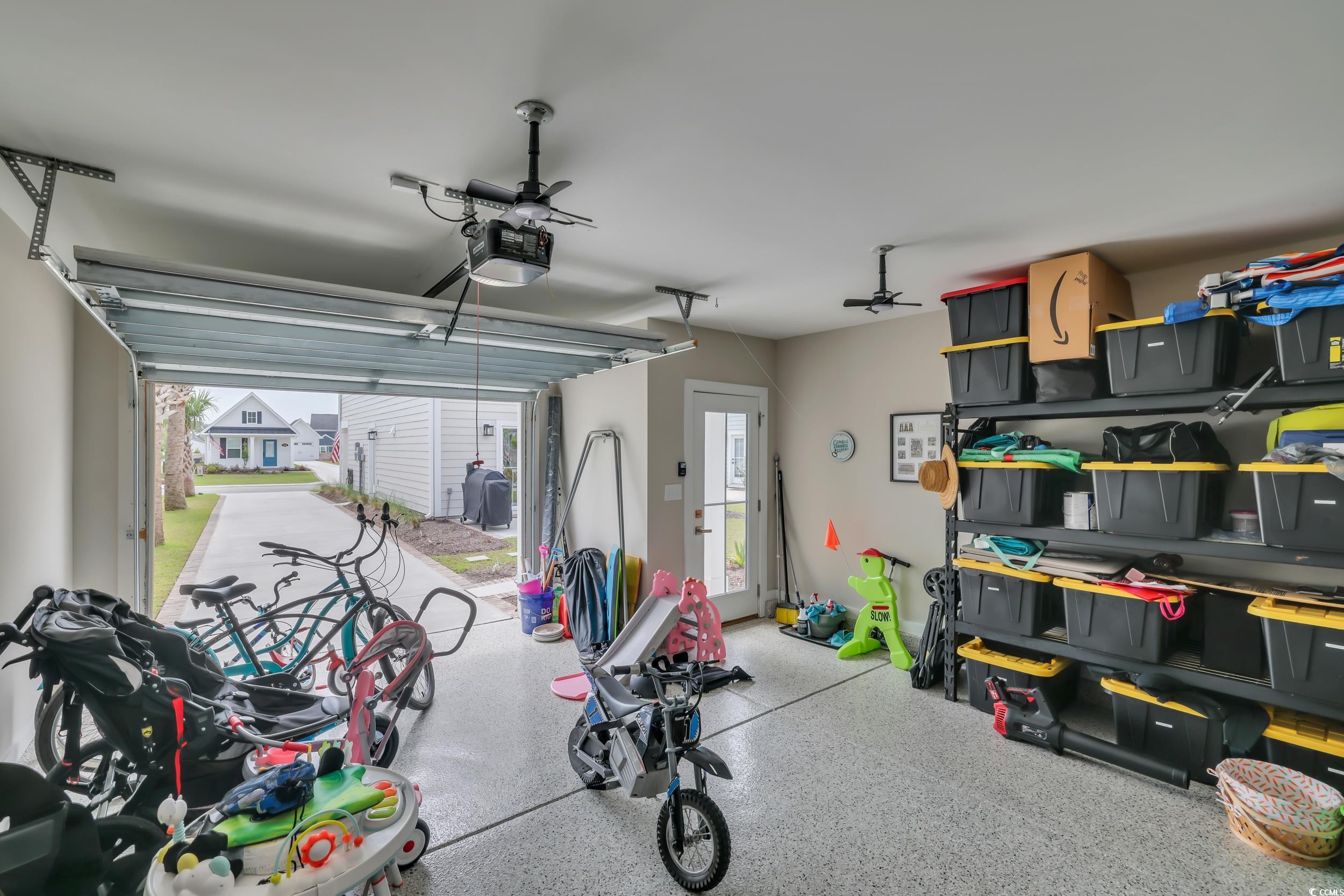 9012 Mabel Court Longs, SC 29568 - Photo 19 of 26 Garage with a garage door opener