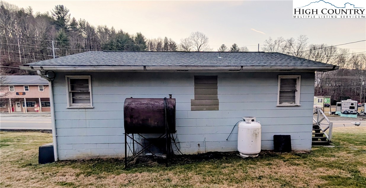 1630 Highway 194 Boone, NC 28607 - Photo 3 of 12 a view of a small house with backyard