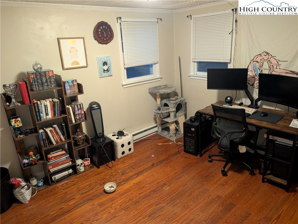 1630 Highway 194 Boone, NC 28607 - Photo 7 of 12 a view of a workspace with furniture and a gym