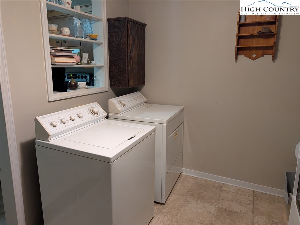 1630 Highway 194 Boone, NC 28607 - Photo 10 of 12 a utility room with dryer and washer