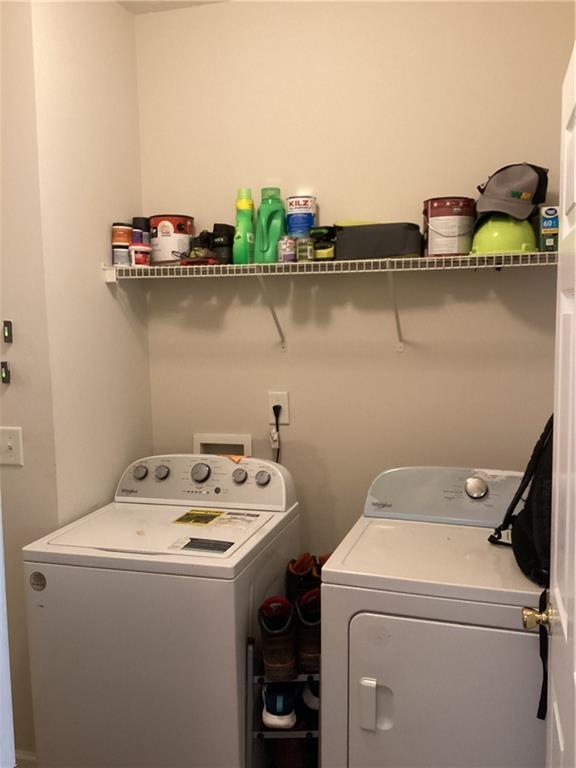 2546 Tullamore Circle Snellville, GA 30039 - Photo 17 of 35 a utility room with dryer and washer