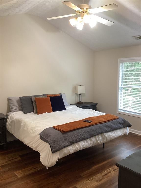 2546 Tullamore Circle Snellville, GA 30039 - Photo 25 of 35 a bedroom with a bed and window