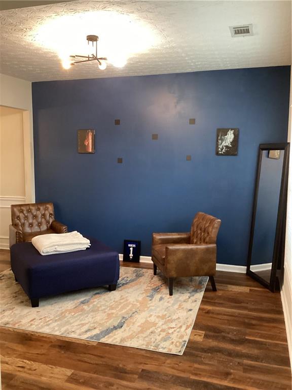 2546 Tullamore Circle Snellville, GA 30039 - Photo 5 of 35 a bathroom with a sink toilet and wooden floor