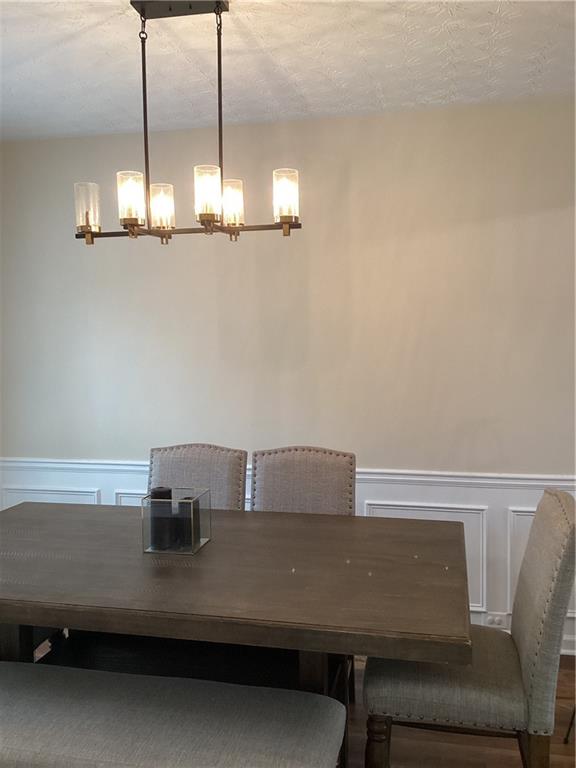 2546 Tullamore Circle Snellville, GA 30039 - Photo 9 of 35 a view of table and chairs in living room