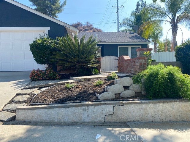 22654 La Rochelle Drive Saugus, CA 91350 - Photo 13 of 13 a front view of a house with porch