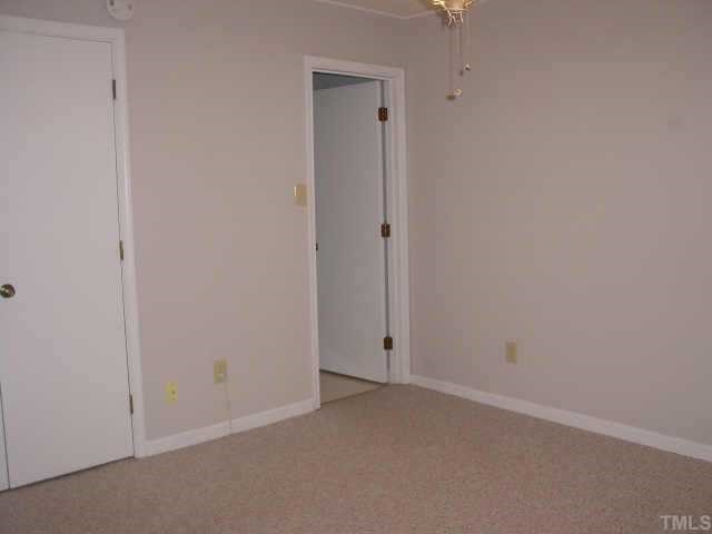 3539 Mill Run Raleigh, NC 27612 - Photo 4 of 10 The master bedroom has stackable washer and dryer included.