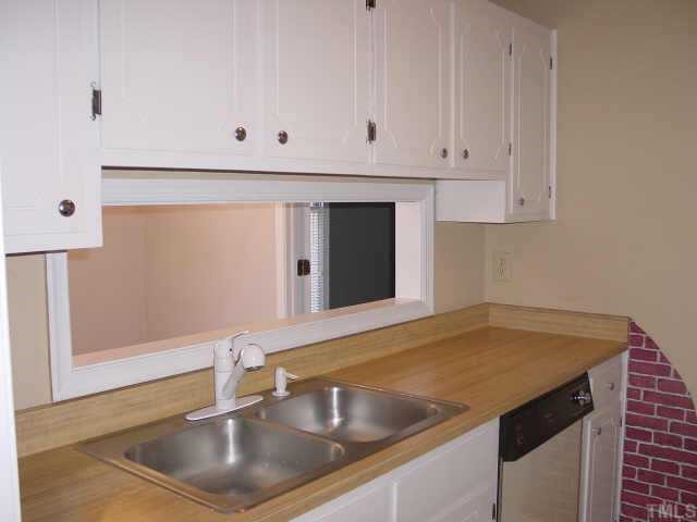 3539 Mill Run Raleigh, NC 27612 - Photo 6 of 10 Cute kitchen has been freshly painted...even the cabinets!