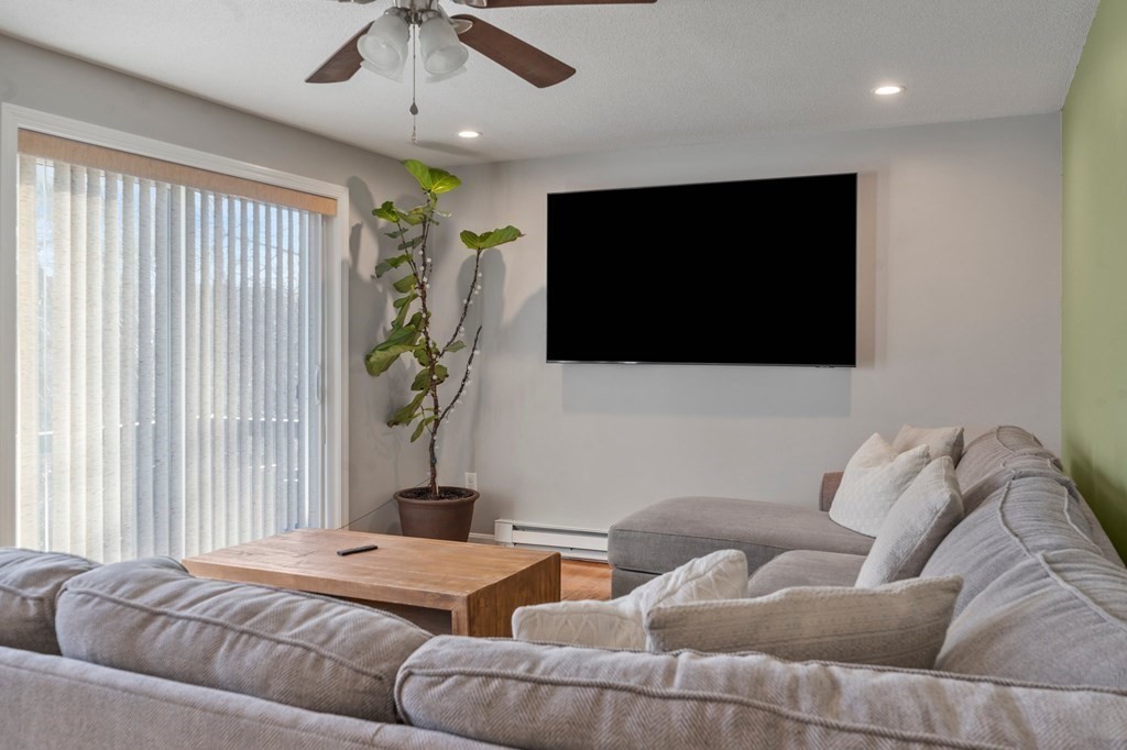 114 Upper Palmer Road Monson, MA 01057 - Photo 10 of 34 a living room with furniture and a flat screen tv