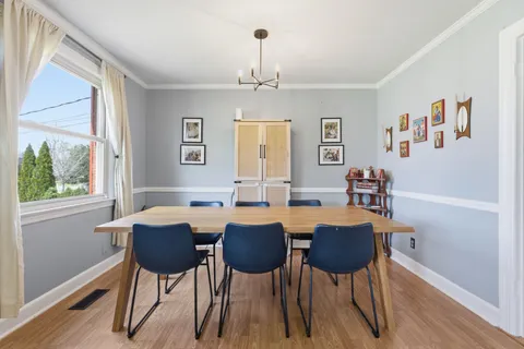 a kitchen with a refrigerator sink and stove