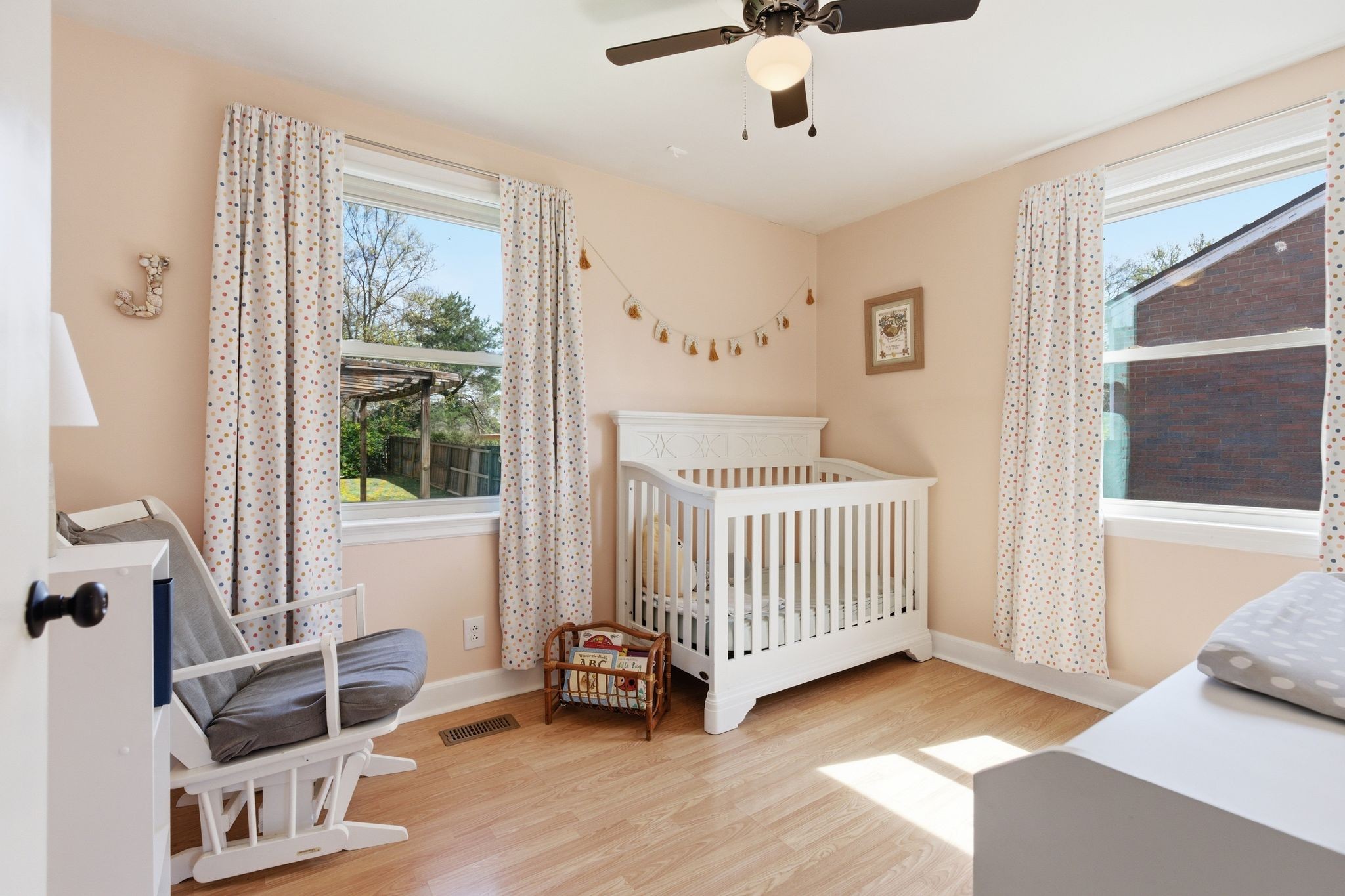 3938 East Ridge Drive Nashville, TN 37211 - Photo 22 of 32 a view of a bedroom with wooden floor and windows
