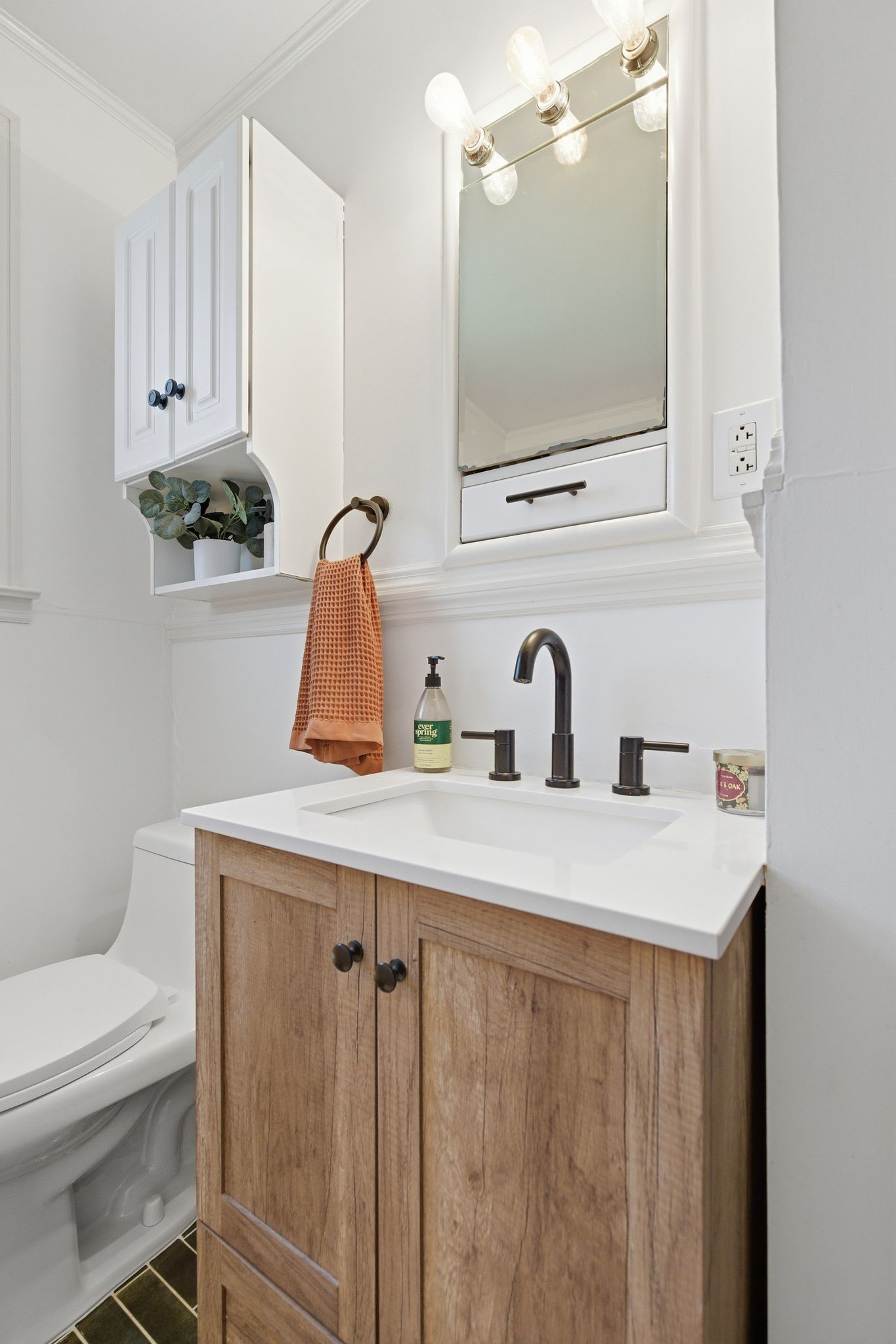 3938 East Ridge Drive Nashville, TN 37211 - Photo 25 of 32 a bathroom with a sink and a mirror