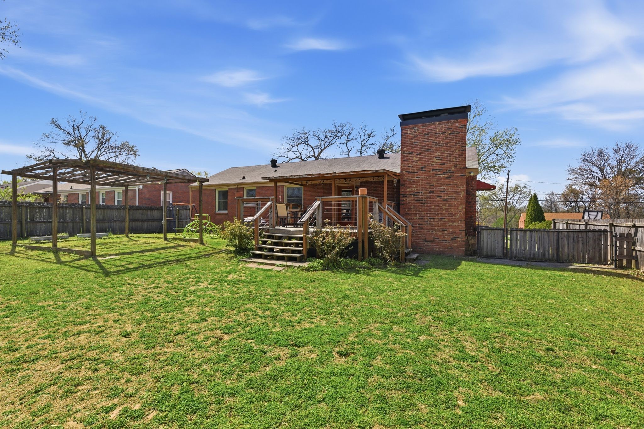 3938 East Ridge Drive Nashville, TN 37211 - Photo 30 of 32 a view of a house with backyard and a garden