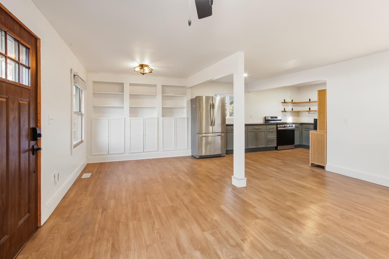 506 Eells Avenue Dixon, IL 61021 - Photo 4 of 19 a view of a kitchen with a stove cabinets and wooden floor