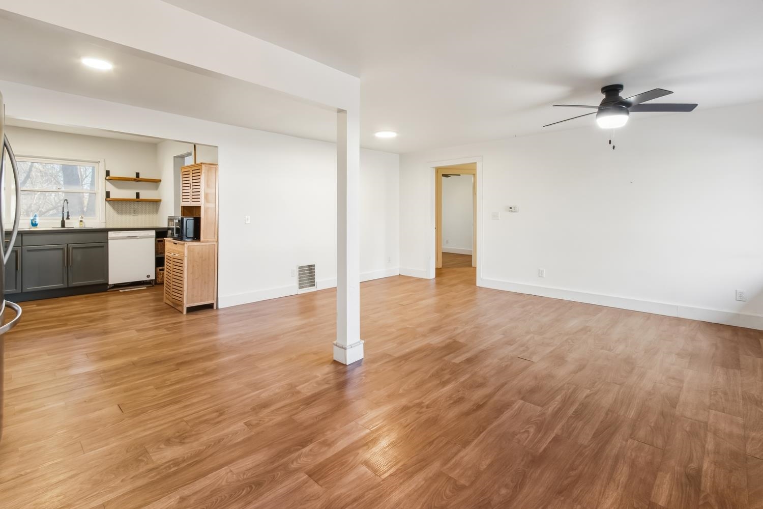 506 Eells Avenue Dixon, IL 61021 - Photo 5 of 19 a view of a kitchen with wooden floor and a sink