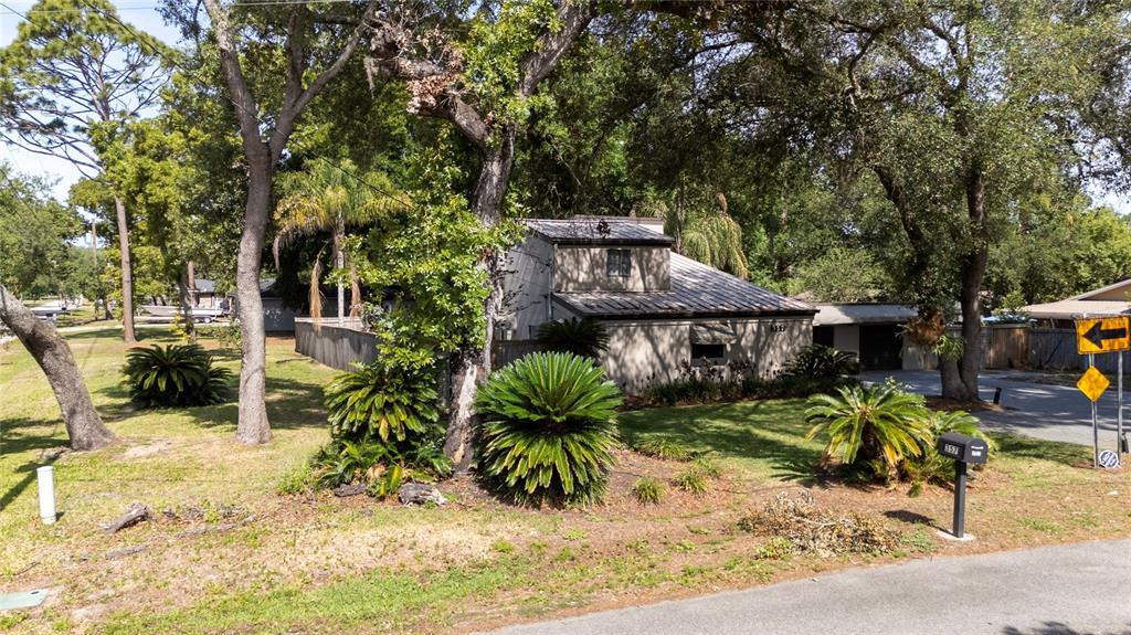 357 Ridgewood Street Altamonte Springs, FL 32701 - Photo 4 of 36 a view of a house with wooden fence