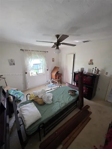 a view of a workspace with furniture