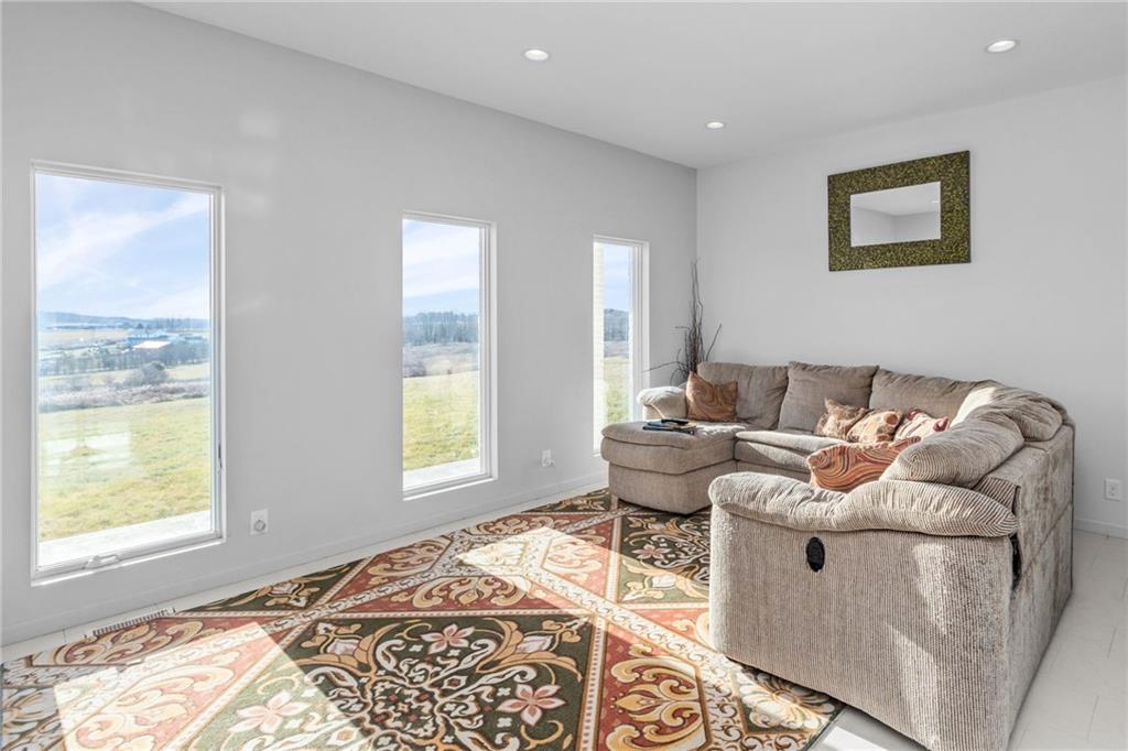 427 Jones Road Harrisville, PA 16038 - Photo 15 of 29 a living room with furniture and a window