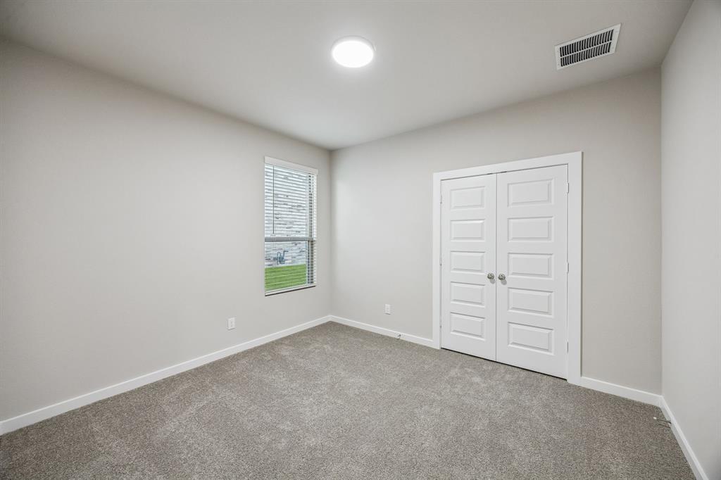 1404 Companero Street Haslet, TX 76052 - Photo 29 of 40 Bedroom in the Wimbledon home plan by Trophy Signature Homes – REPRESENTATIVE PHOTO