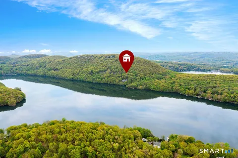 a view of a street with a big yard