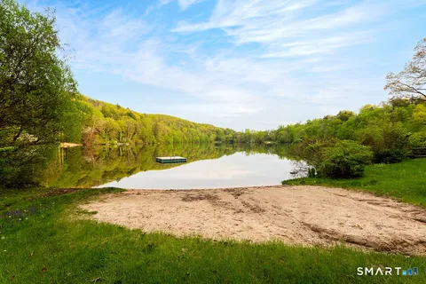 a view of a field with an trees
