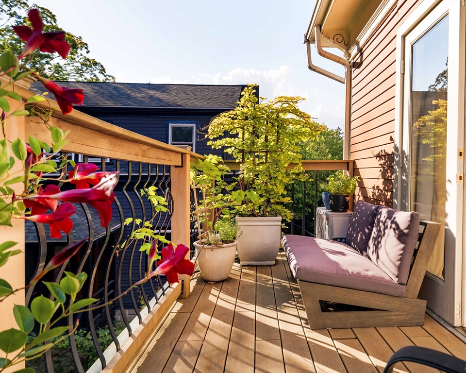 61 Dana Street, Unit 4 Cambridge, MA 02138 - Photo 16 of 25 a outdoor living space with patio furniture