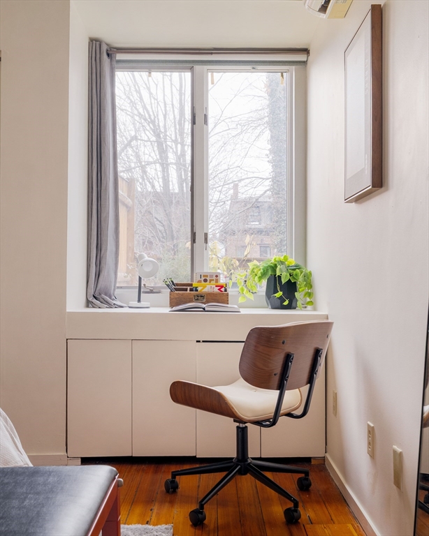 61 Dana Street, Unit 4 Cambridge, MA 02138 - Photo 20 of 25 a view of a dining room with furniture and a window