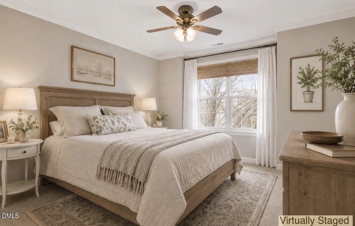 2907 Andover Glen Road Raleigh, NC 27604 - Photo 30 of 39 a bedroom with a large bed and a window