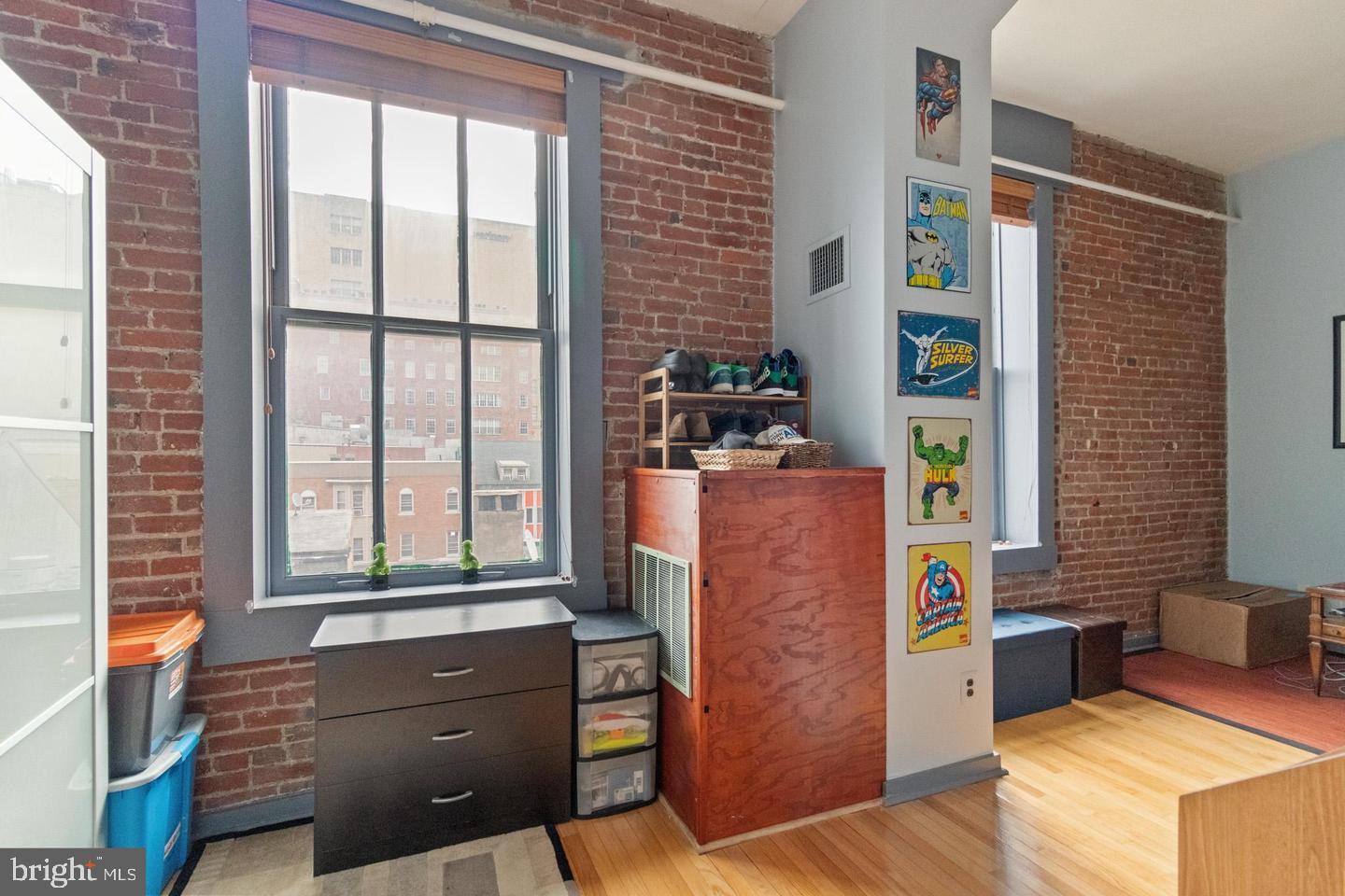 1010 Race Street, Unit 5D Philadelphia, PA 19107 - Photo 12 of 25 a dining room with furniture and a window