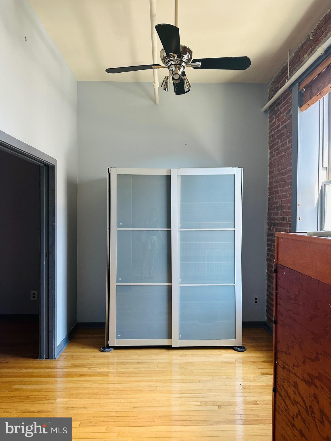 1010 Race Street, Unit 5D Philadelphia, PA 19107 - Photo 19 of 25 a view of an empty room with closet and a window