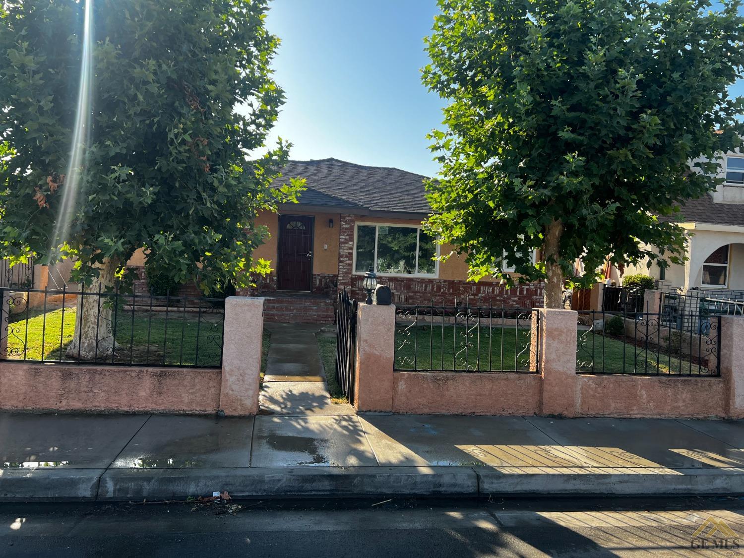 Undisclosed Address Bakersfield, CA 93304 - Photo 1 of 18 a view of backyard with a patio