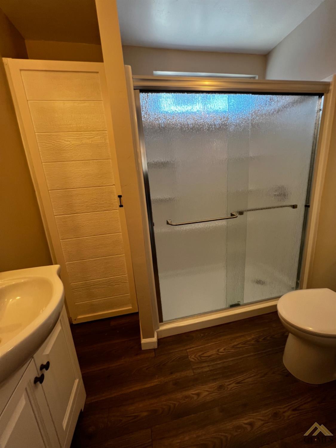 Undisclosed Address Bakersfield, CA 93304 - Photo 17 of 18 a bathroom with a sink and a toilet