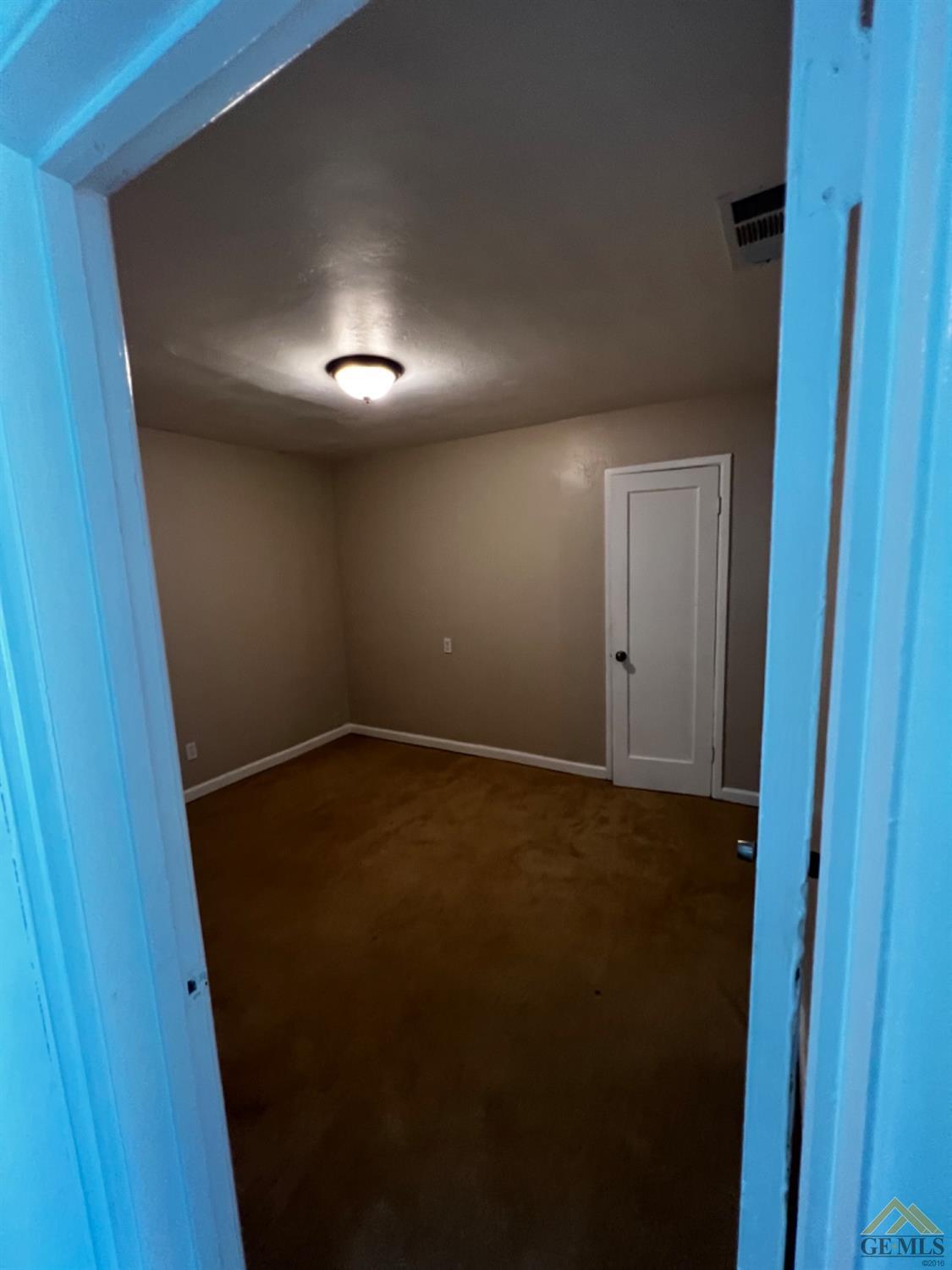 Undisclosed Address Bakersfield, CA 93304 - Photo 4 of 18 a view of an empty room