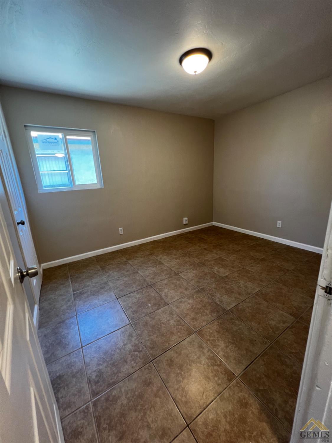 Undisclosed Address Bakersfield, CA 93304 - Photo 6 of 18 a view of an empty room