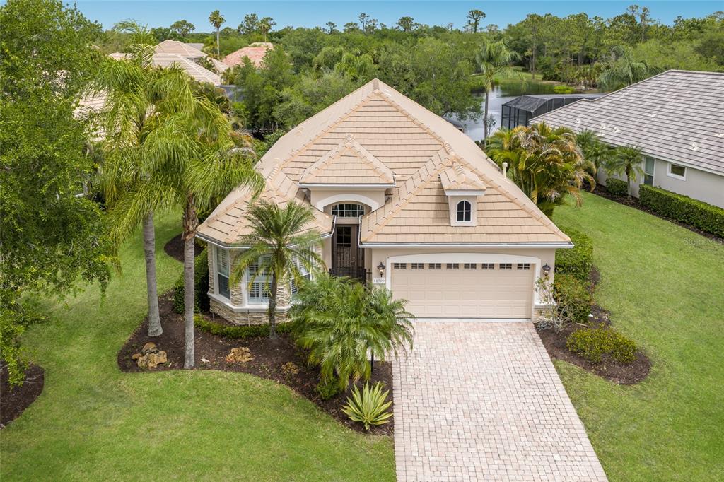 11709 Strandhill Court Lakewood Ranch, FL 34202 - Photo 1 of 51 a view of house with outdoor space