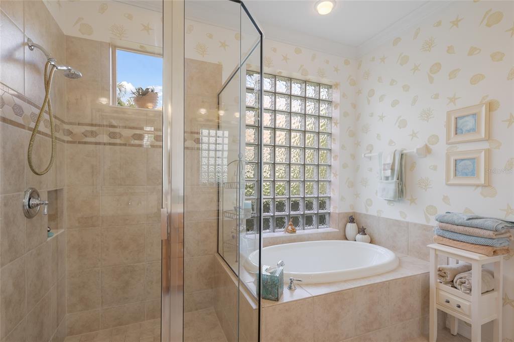 11709 Strandhill Court Lakewood Ranch, FL 34202 - Photo 23 of 51 a bathroom with a sink and a mirror