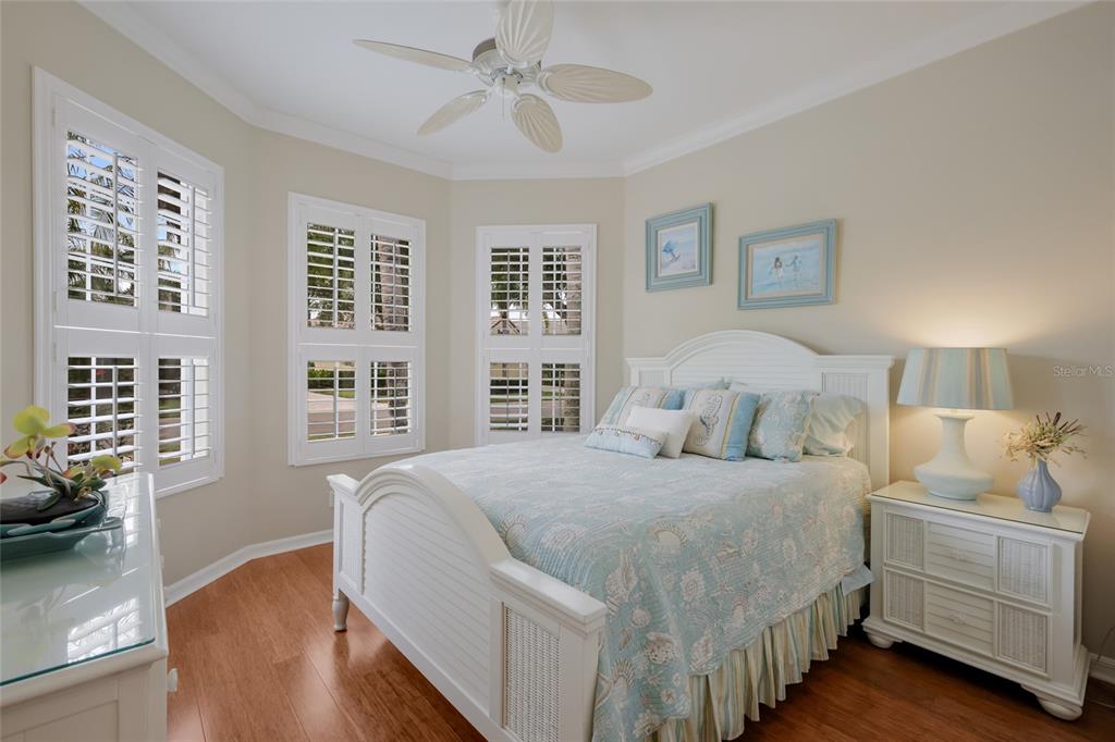 11709 Strandhill Court Lakewood Ranch, FL 34202 - Photo 25 of 51 a bedroom with a large bed and a window