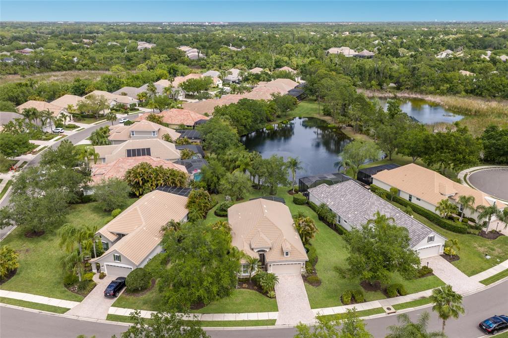 11709 Strandhill Court Lakewood Ranch, FL 34202 - Photo 30 of 51 an aerial view of residential houses with outdoor space and river
