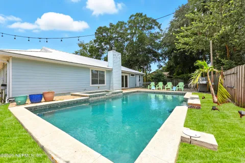 a view of a house with a swimming pool