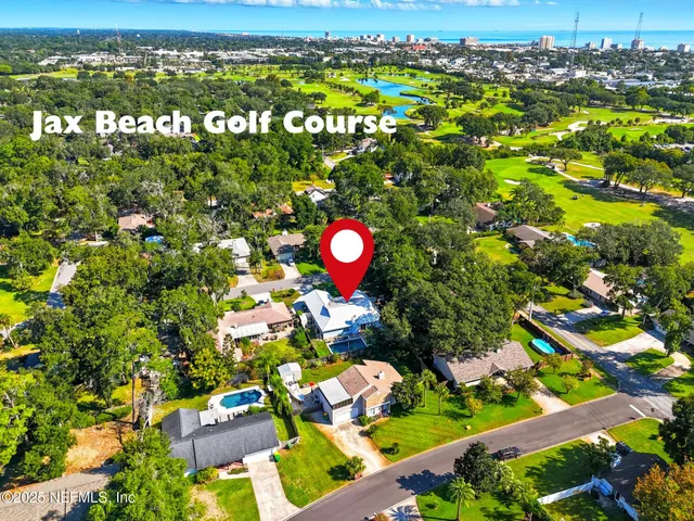 a view of a multi story yard with an umbrella