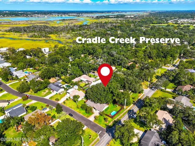 a view of a lake with a building in the background