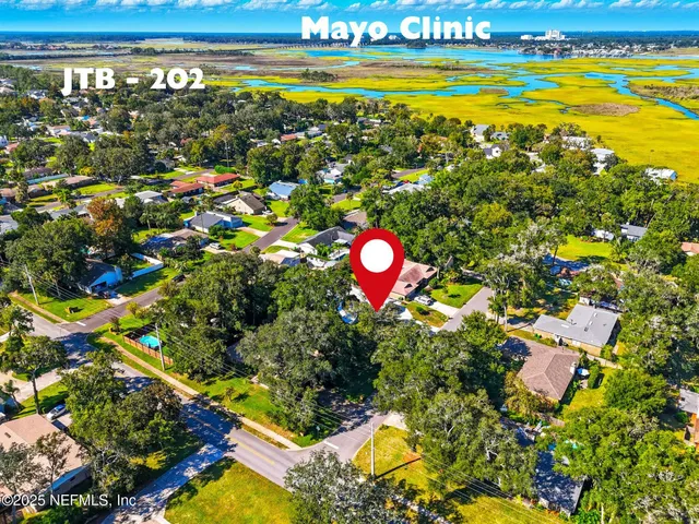 a view of a houses with swimming pool