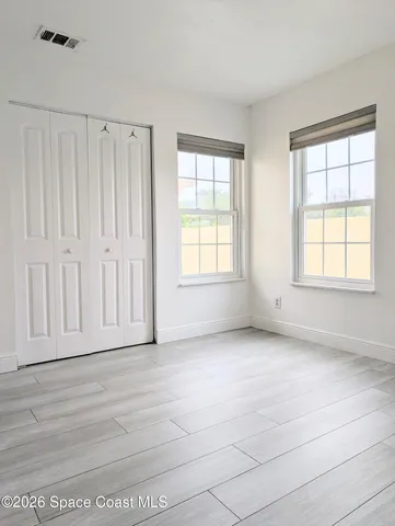 an empty room with windows