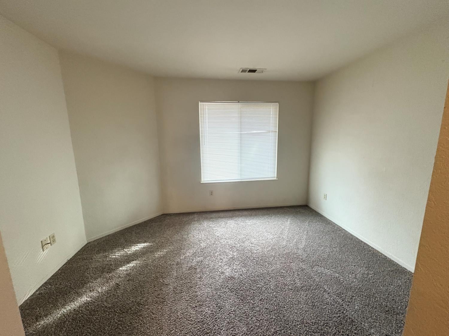 1829 Oak Leaf Drive Modesto, CA 95354 - Photo 19 of 31 an empty room with a window