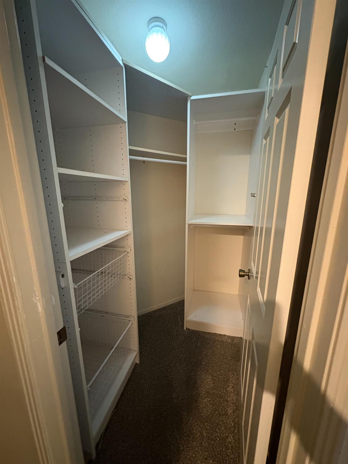 1829 Oak Leaf Drive Modesto, CA 95354 - Photo 26 of 31 a view of walk in closet with empty racks