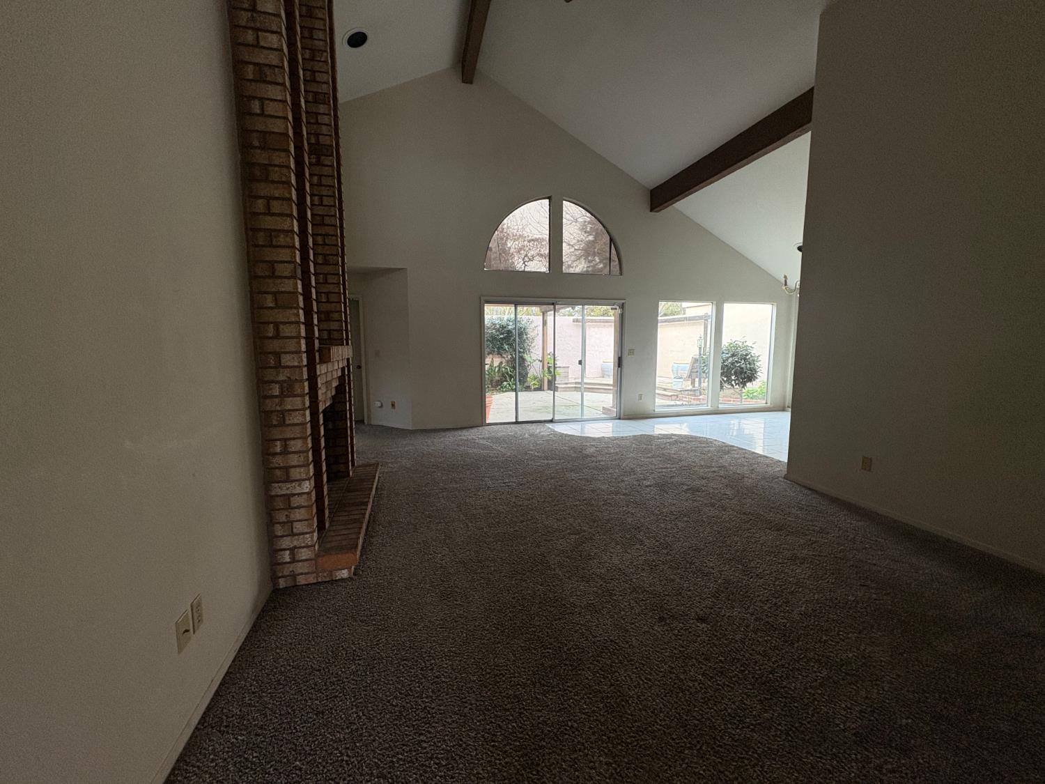 1829 Oak Leaf Drive Modesto, CA 95354 - Photo 5 of 31 an empty room with windows