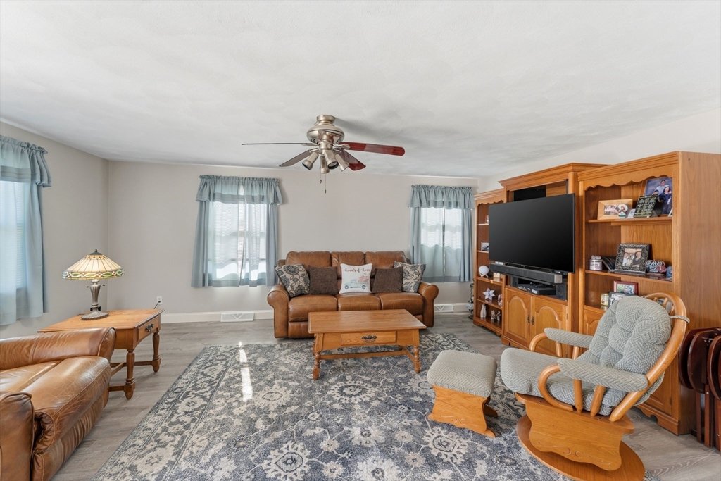 76 Lake Street Pawtucket, RI 02860 - Photo 5 of 18 a living room with furniture and a flat screen tv